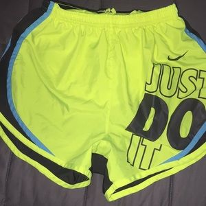 Highlighter yellow, blue, and dark grey shorts